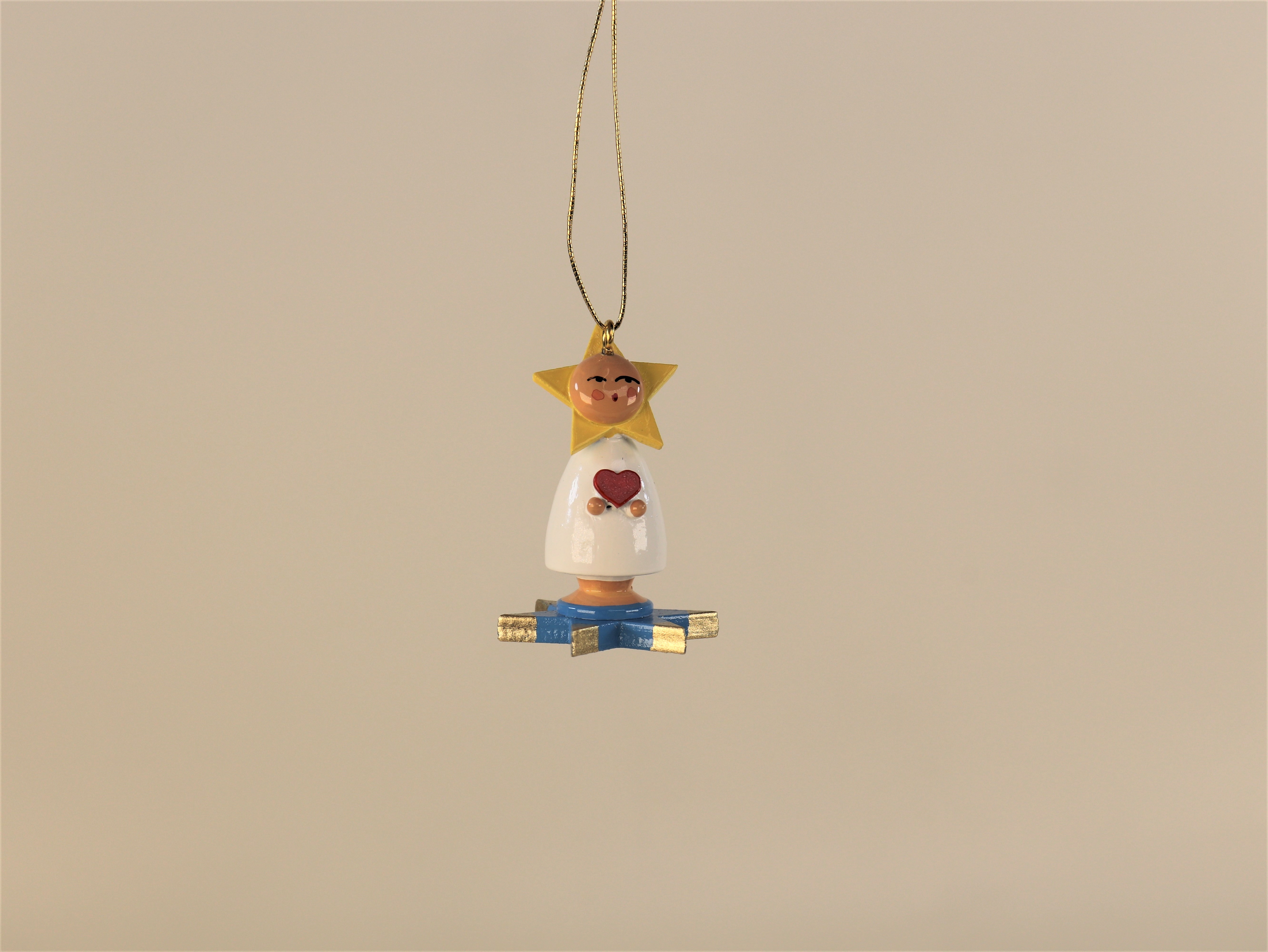 Sternenkind auf Stern als Winter- / Weihnachts-Baumschmuck