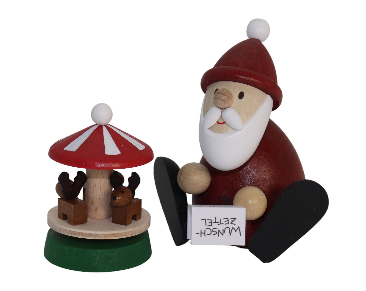 Holzfigur Weihnachtsmann neben der Holzfigur Karrussell zum Hinstellen als Dekofigur