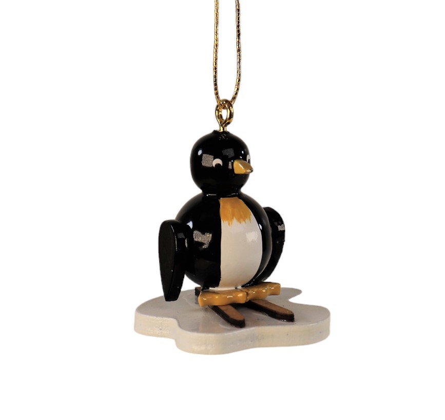 Baumbehang auf Sockel "Pinguin mit Ski"