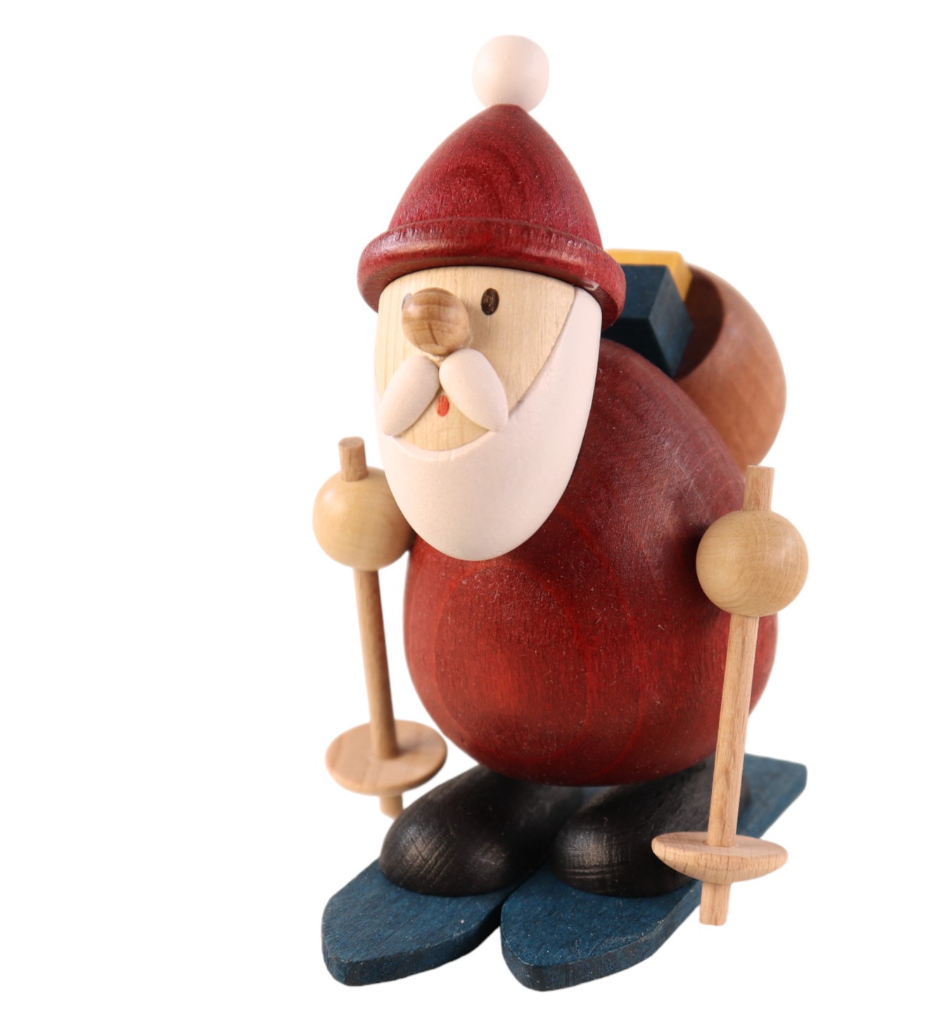 Detailreich gestaltete Figur aus Holz zum Hinstellen: Weihnachtsmann auf Skiern.