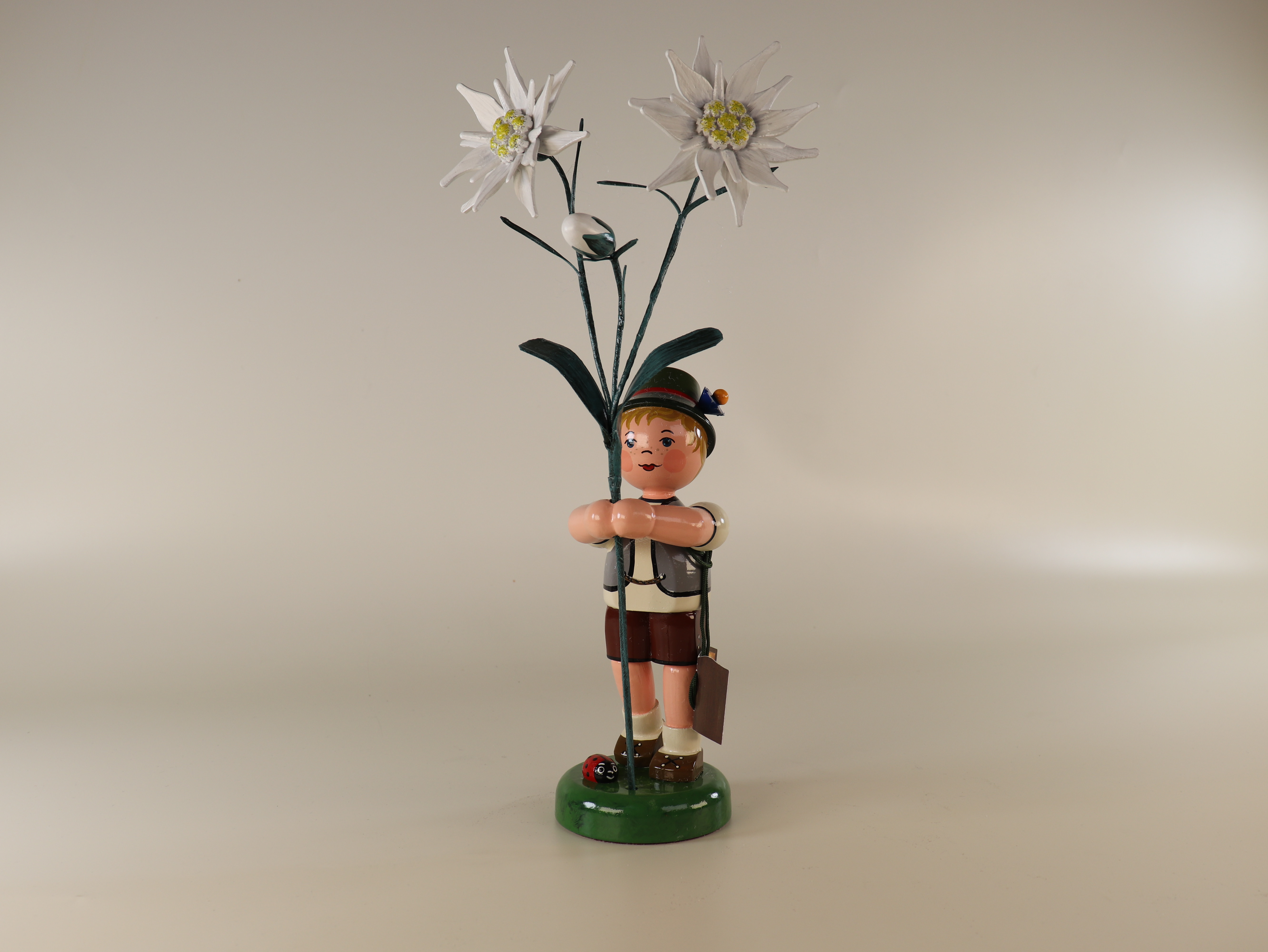 Tischdeko Blumenkind Junge mit Edelweiß
