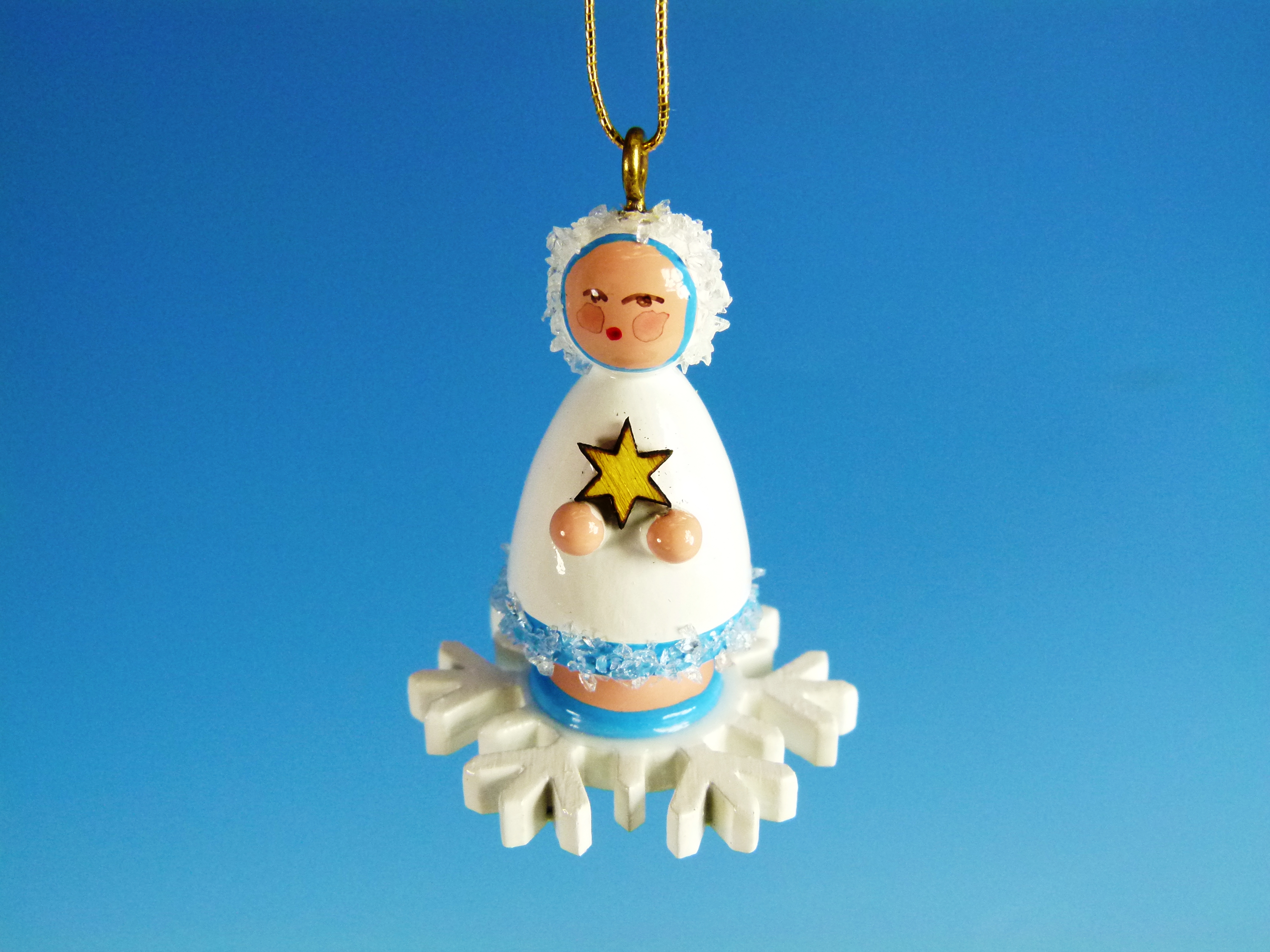 Winter- / Christ-Baumanhänger Winterkind auf Schneeflocke