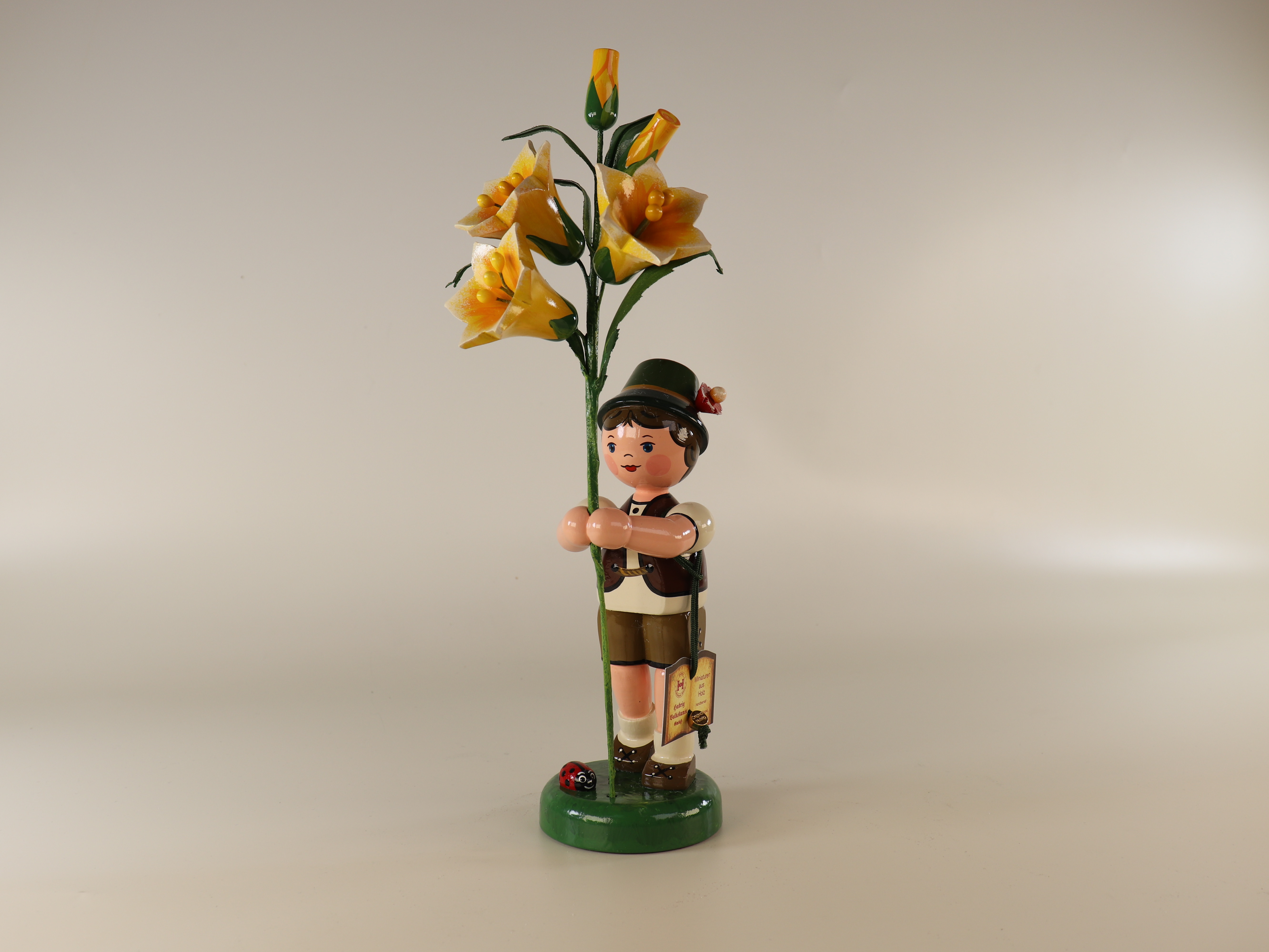 Tischdeko Blumenkind Junge mit Lilie