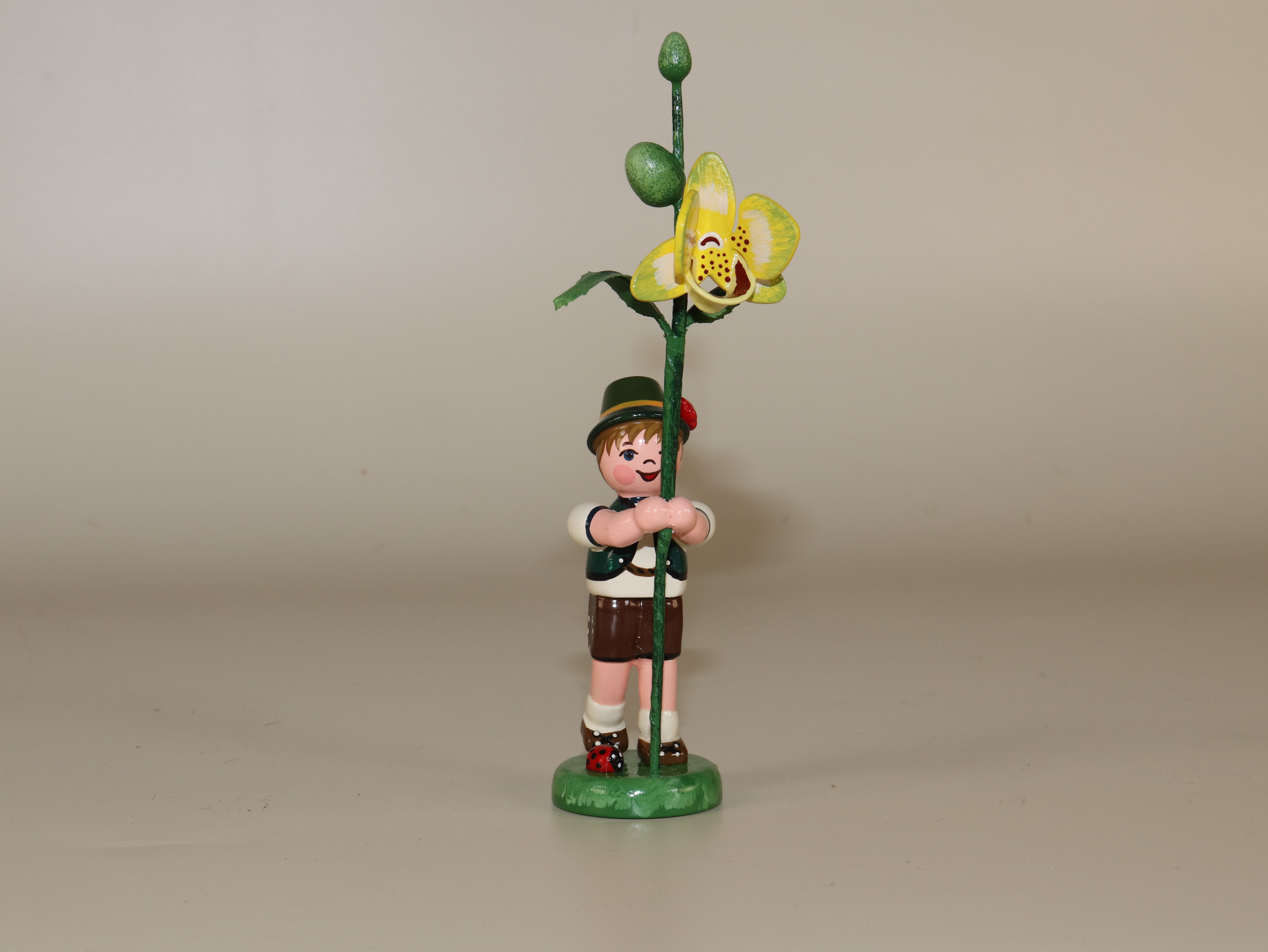 Frühlings-Tischschmuck Blumenkind "Junge mit Orchidee"